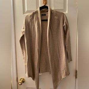 Tan over top light sweater